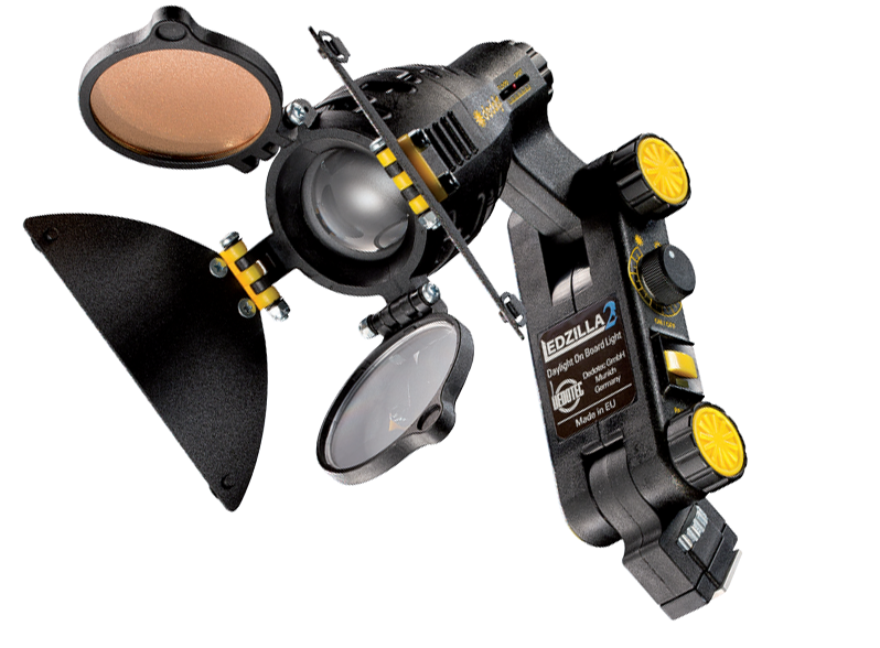 Dedolight Ledzilla2, daylight. Focusable onboard LED light with 16:9 filter and two barn door leaves. 6-18V DC input. Separate battery shoe or mains power supply DLPS-12 required.